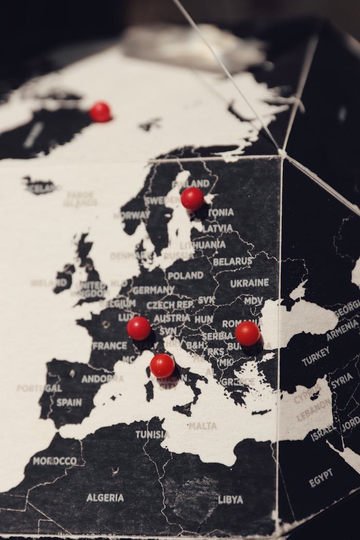 Detailed map of Europe with red pins marking major locations. Ideal for travel and cartography themes.